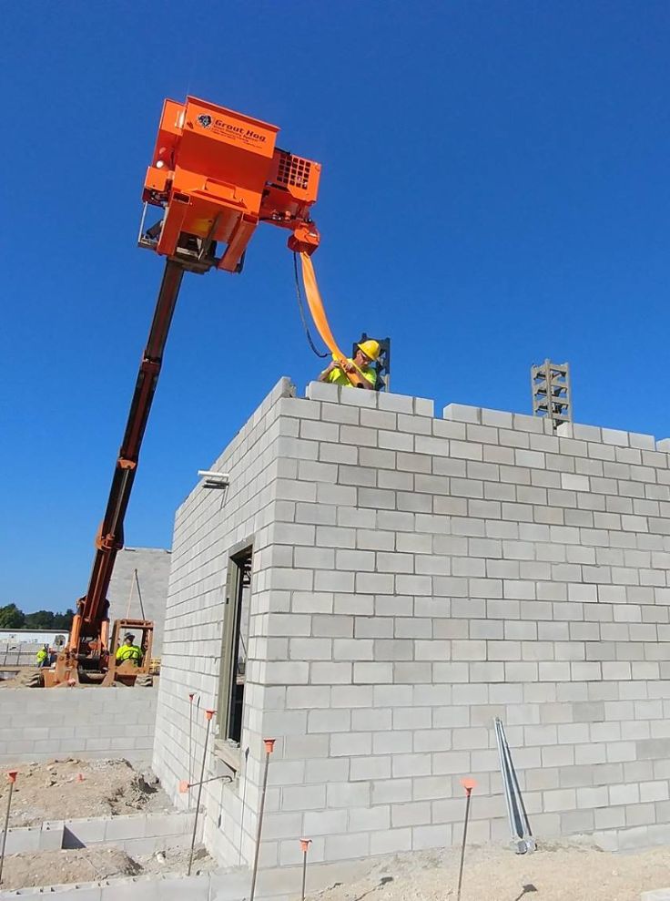 Grouting Tall Walls: Methods, Code, and Equipment