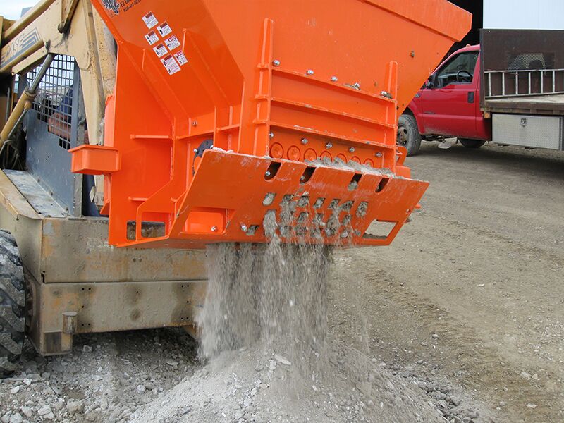 EZG Manufacturing Hog Crusher discharging pulverized debris