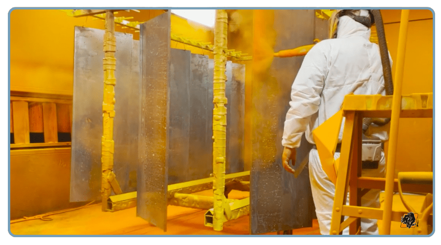 EZG worker painting sheet metal 